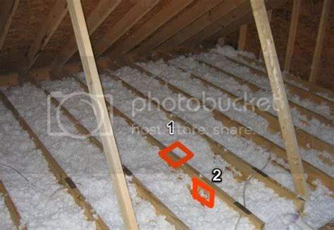 junction box under attic floor|attic junction box under insulation.